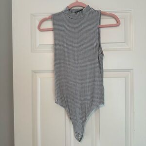 Express one eleven black and white striped body suit